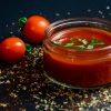 tomato and tomato puree with parsley in bowl